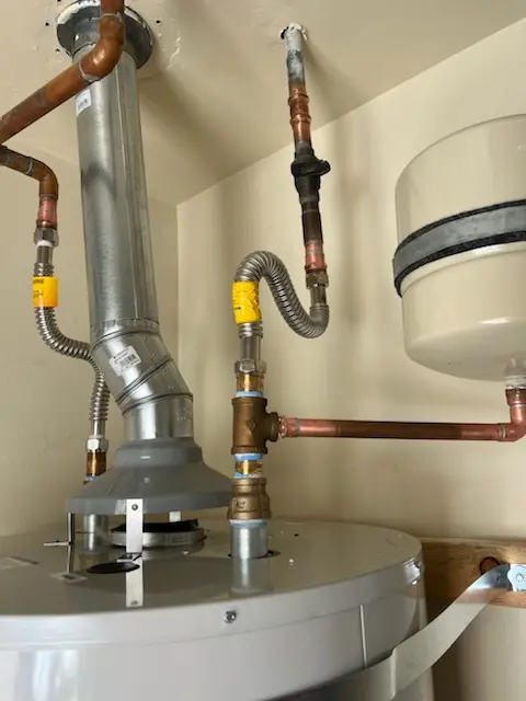 Water heater installation and plumbing repair in Bedford Center