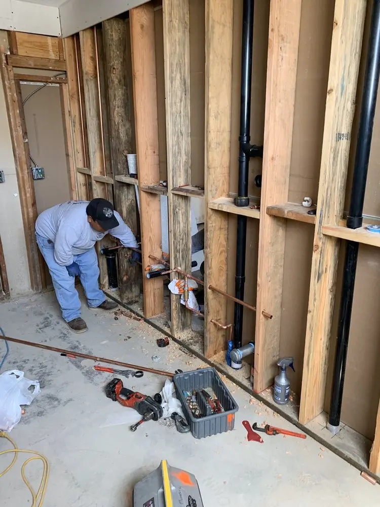 Commercial rough-in plumbing for Water Heater Replacement in Bedford Center